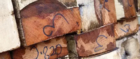 Recycled hardwood beams stacked at Moss Vale timber yard