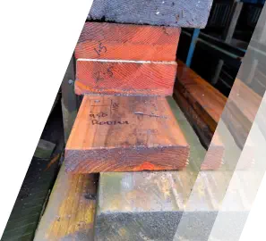 Recycled hardwood beams stacked at Moss Vale timber yard
